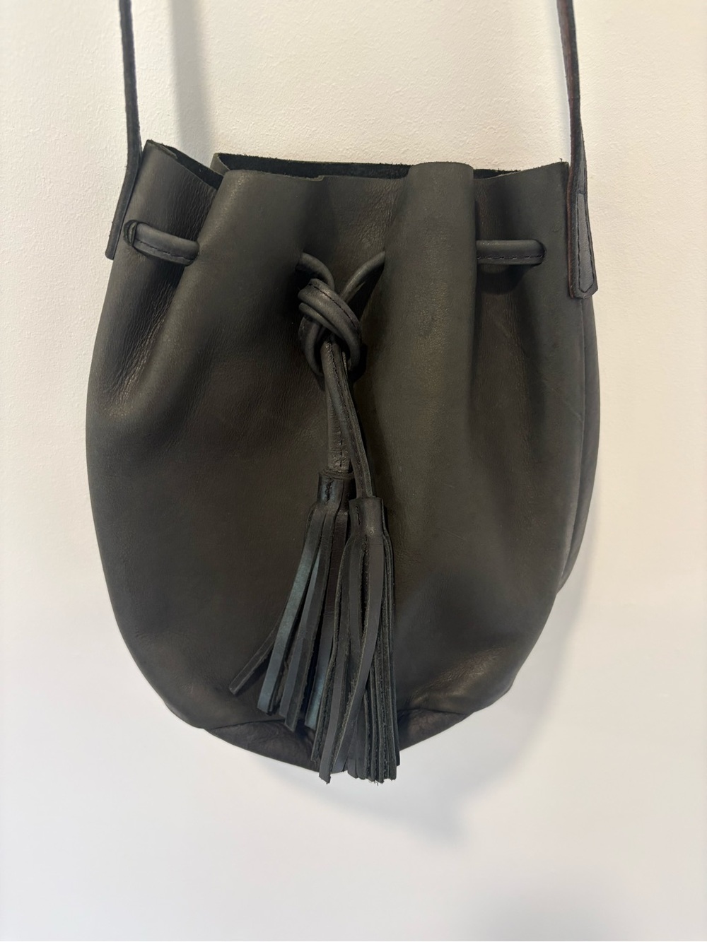 Able Black Leather Drawstring Tassel Bucket Shoulder Bag